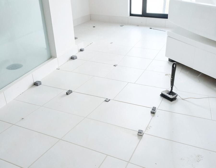 Large format tile floor installation